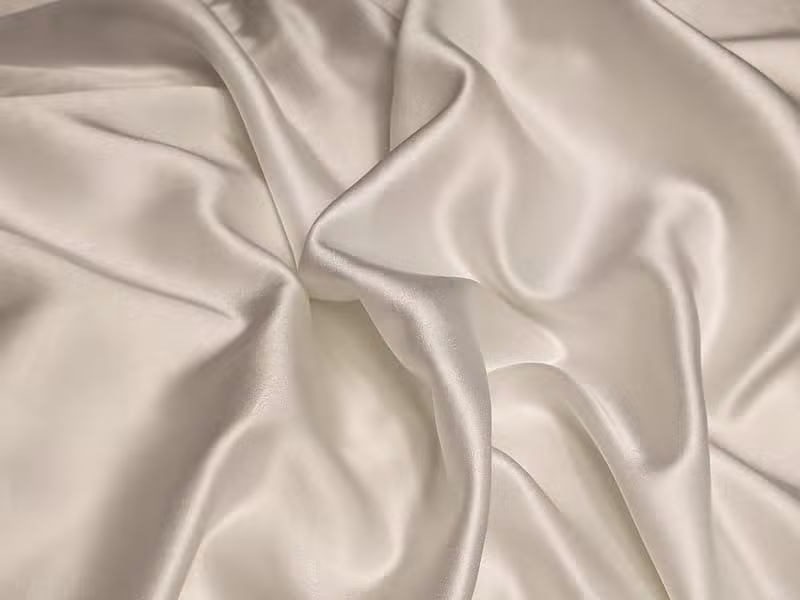Detail of soft silk fabric used in Eden.Veilee pieces