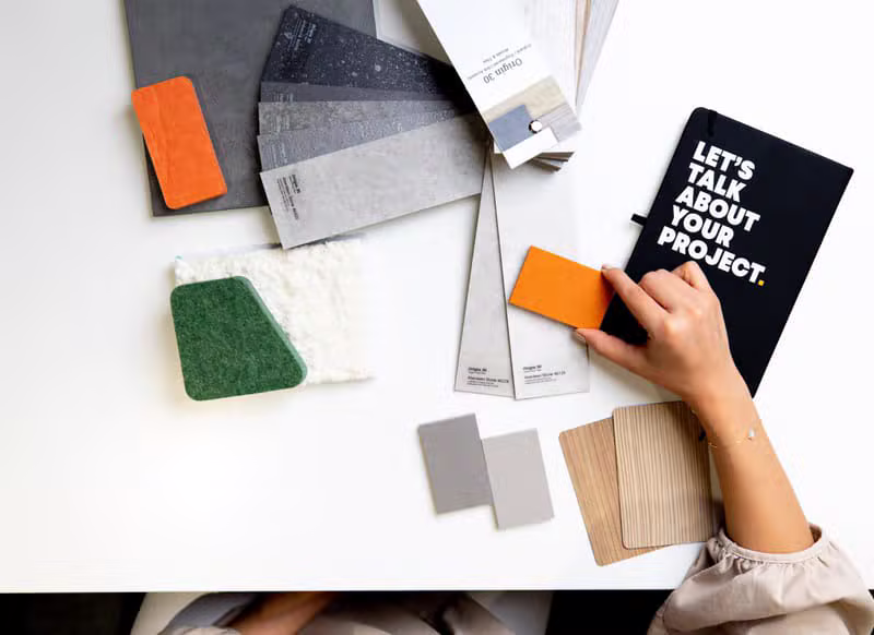 Fabric and colour palette laid out during a wardrobe consultation