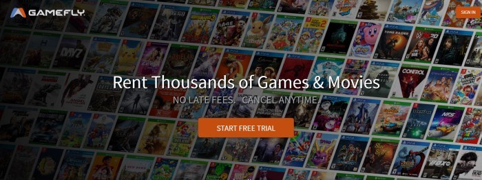 This screenshot of the home page for GameFly has a dark filtered photo showing several rows of video game covers, along with an orange call-to-action button and white text inviting customers to invite games and movies.