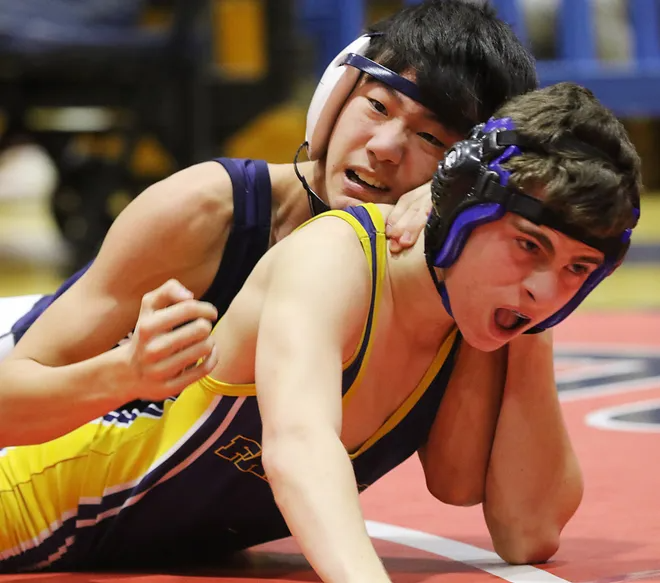Daniel Hong of Paramus defeated Andrew Ivanovski of Saddle Brook in a 113 lb. match at the BCCA Holiday Wrestling Tournament on December 27, 2019 at Hackensack.