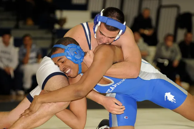From 2009: Joe Down of Paramus (top) battles Teaneck's Leigh Turner at 215. Down won the match by pin during a 49-12 Paramus victory. Down is now the head wrestling coach at Vernon.