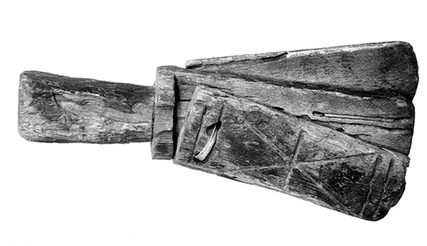 Ancienne cliquette pour lépreux : trois pièces de bois reliées par un ruban. L'agrandissement montre un lépreux agitant sa cliquette, Barthélémy l'Anglais, Livre des propriétés de choses, France, XVe siècle.
