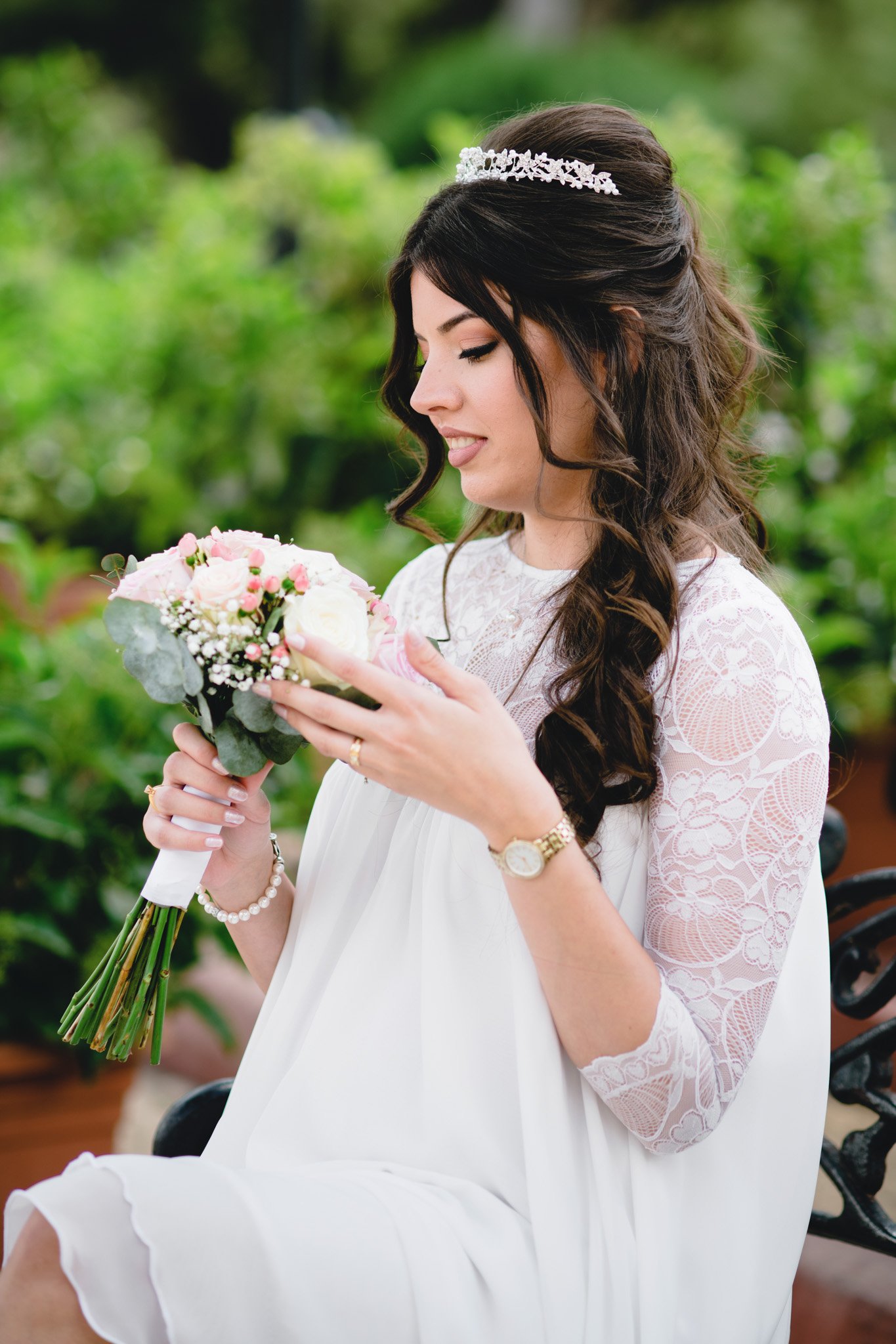 bride portrait holding wedding flower bouquet