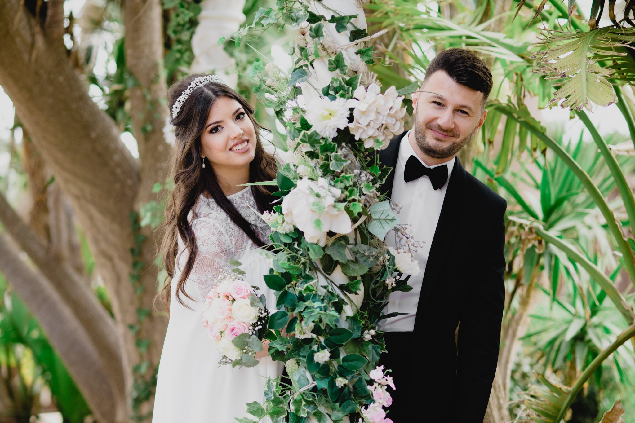 bride and groom photo session in gardens of bacchus restaurant