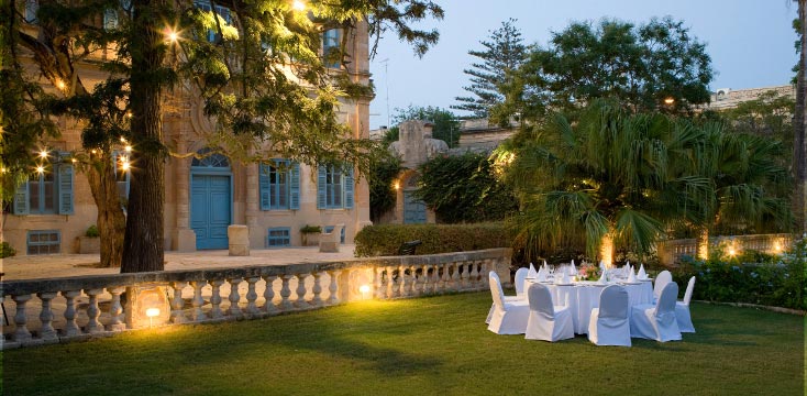 Outdoor wedding setup at Villa Bologna in Malta