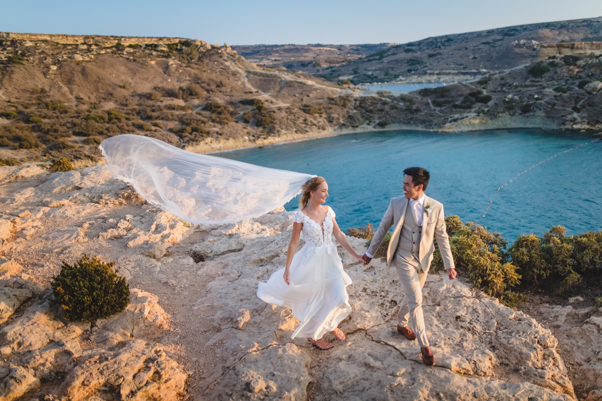 A typical wedding photo taken at Golden Bay in Malta