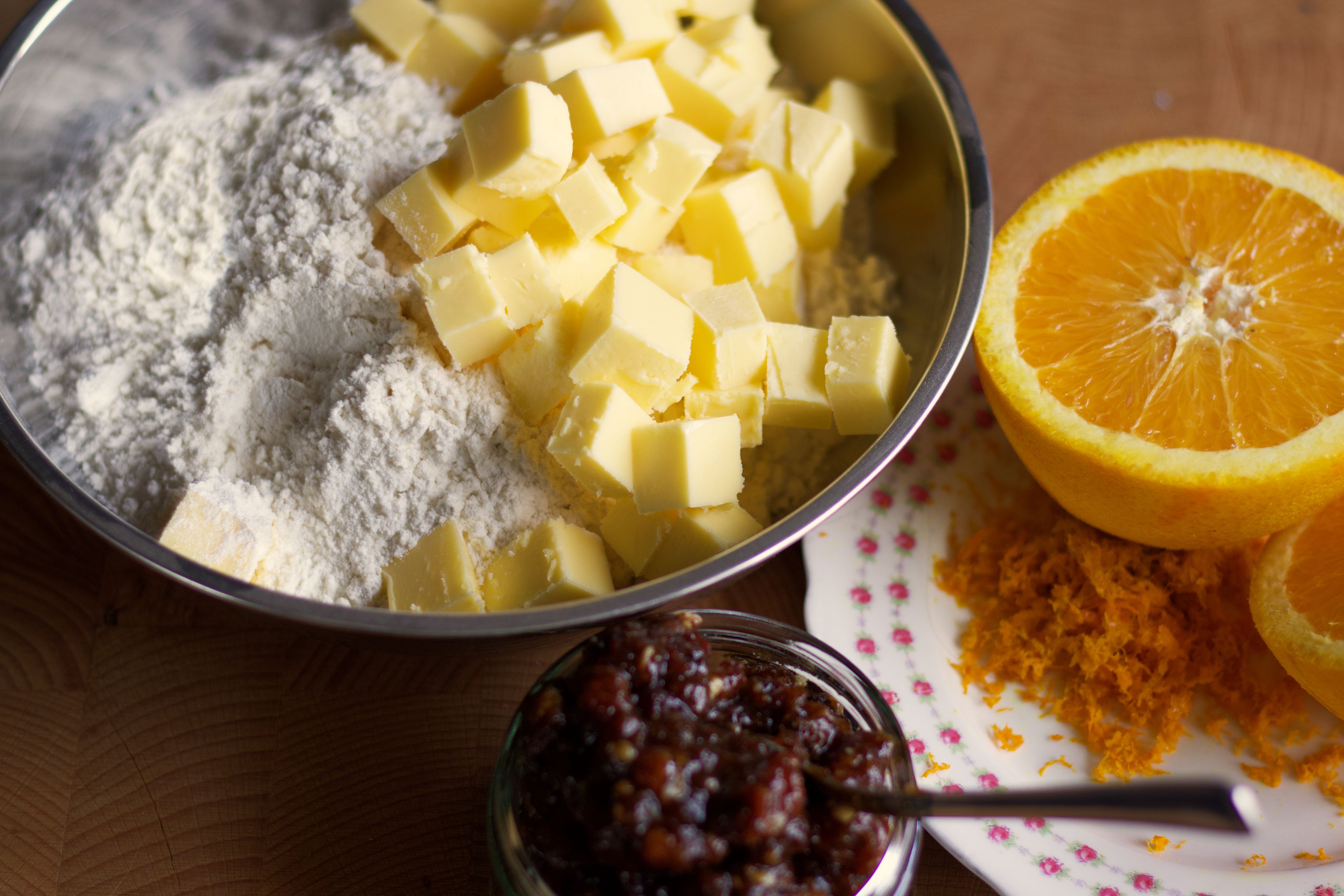 Ingredients for making mince pies, butter, flour, orange, mincemeat