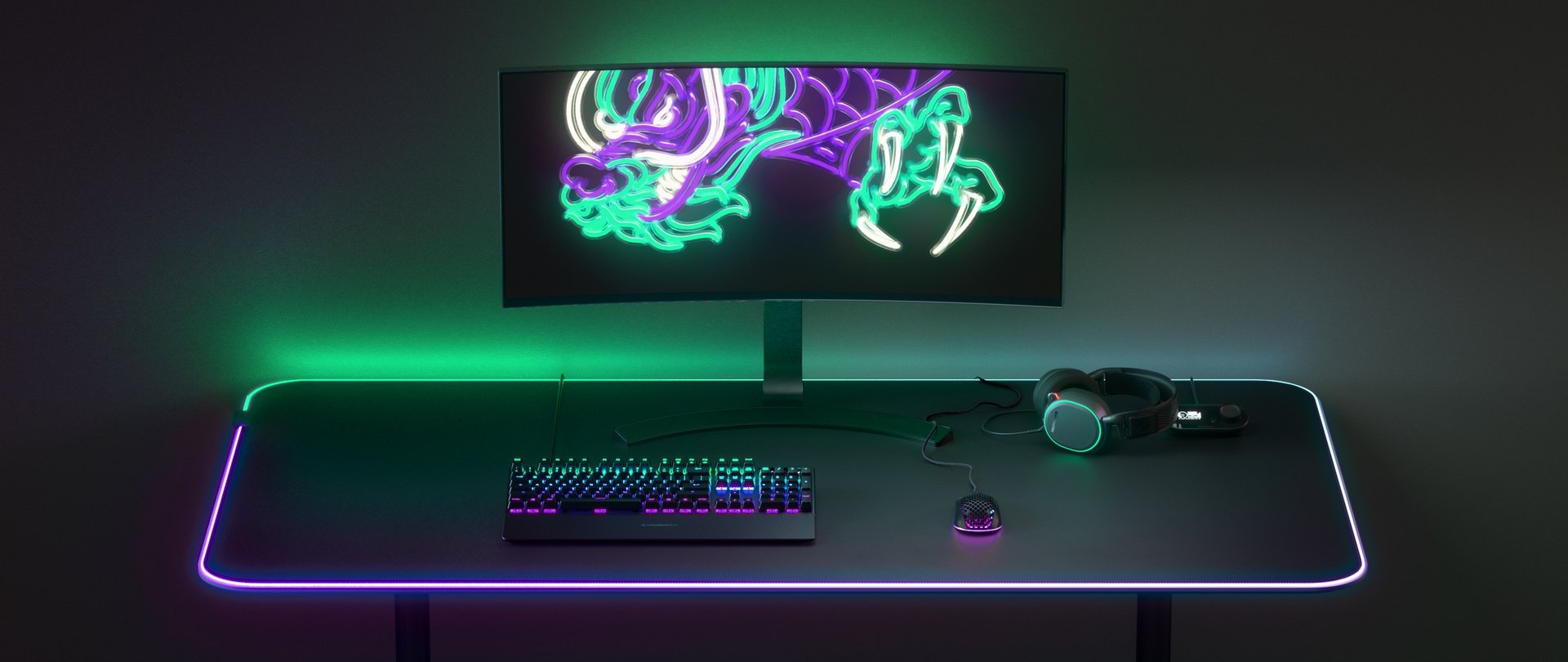 An full desktop setup, with an Apex Pro keyboard, Aerox 3 mouse and a Arctis Pro headset