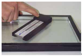 Figure 3: An optical inspection instrument for measuring glass and spacer thickness
