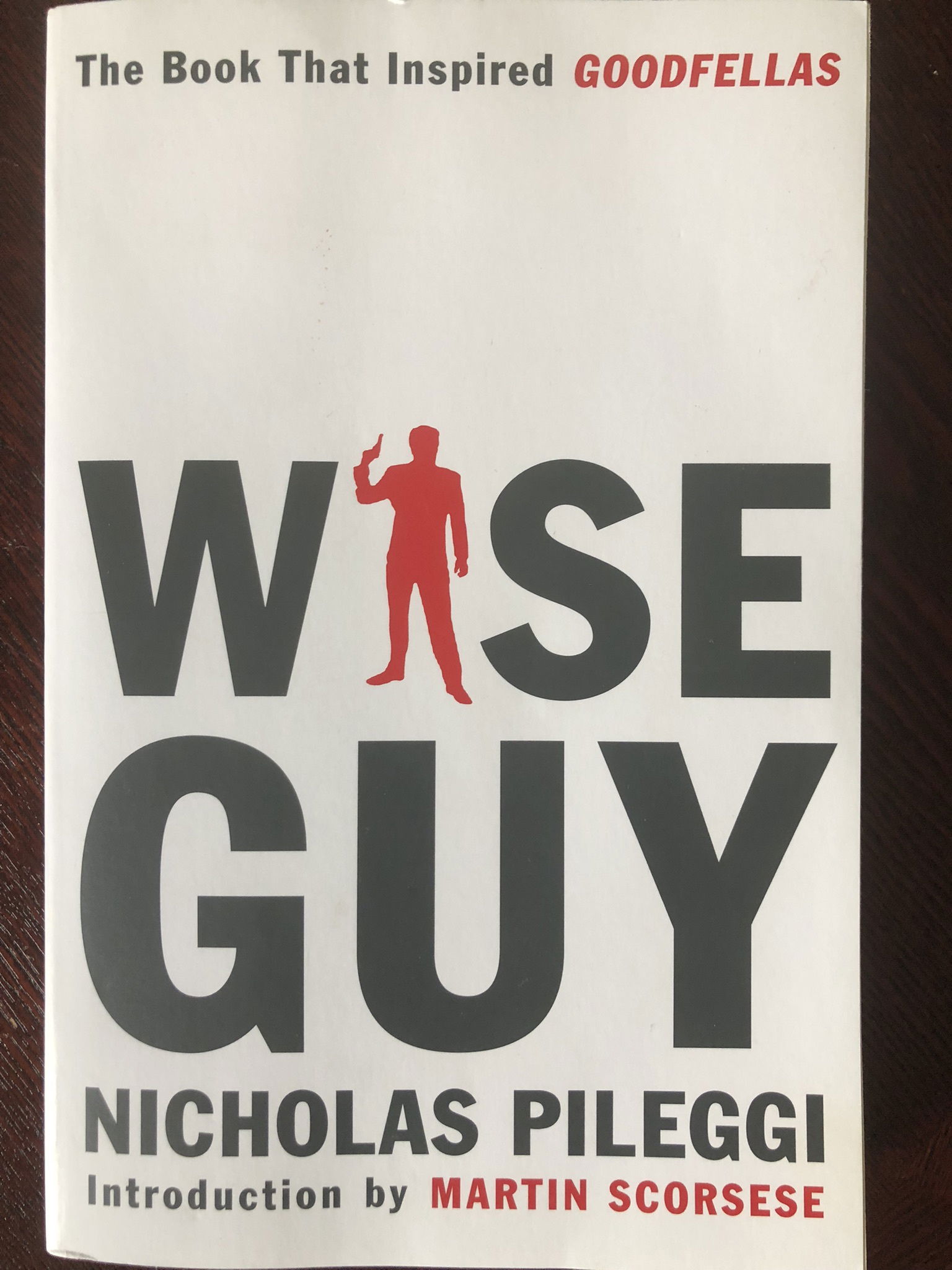 “Wiseguy” A Book Report   “Wiseguy” is a non-fiction book written by Nicholas Pileggi, published in 1985. The book is based on the life of Henry Hill, a mobster who worked for the Lucchese crime family in New York City. The book details Hill’s rise in the mob, his involvement in various criminal activities, and his eventual cooperation with the FBI. Wiseguy is two-hundred and sixty-three pages. I remember reading that Martin Scorsese was in the airport and needed something to read on the plane. He picked up the book Wiseguy and supposedly that is how it all began. Scorsese received an Academy Award for Best Director for Goodfellas in 1990. It goes into detail of the way organized crime operated in the 1980’s. There is much more information in the book than the movie allowed. How young Henry became involved in selling cigarettes and the downfall of that endeavor. Who had Tommy Desimone killed and why? It’s a great read and Nicholas Pileggi is a talented writer. He has stories which came right from the actual characters you saw on screen. If you are into gangsters and you never read Wiseguy, then you owe to yourself to read it. It is definitely a classic. We all know that Goodfellas was a classic and a hit movie. However, reading the book is an eye opener.