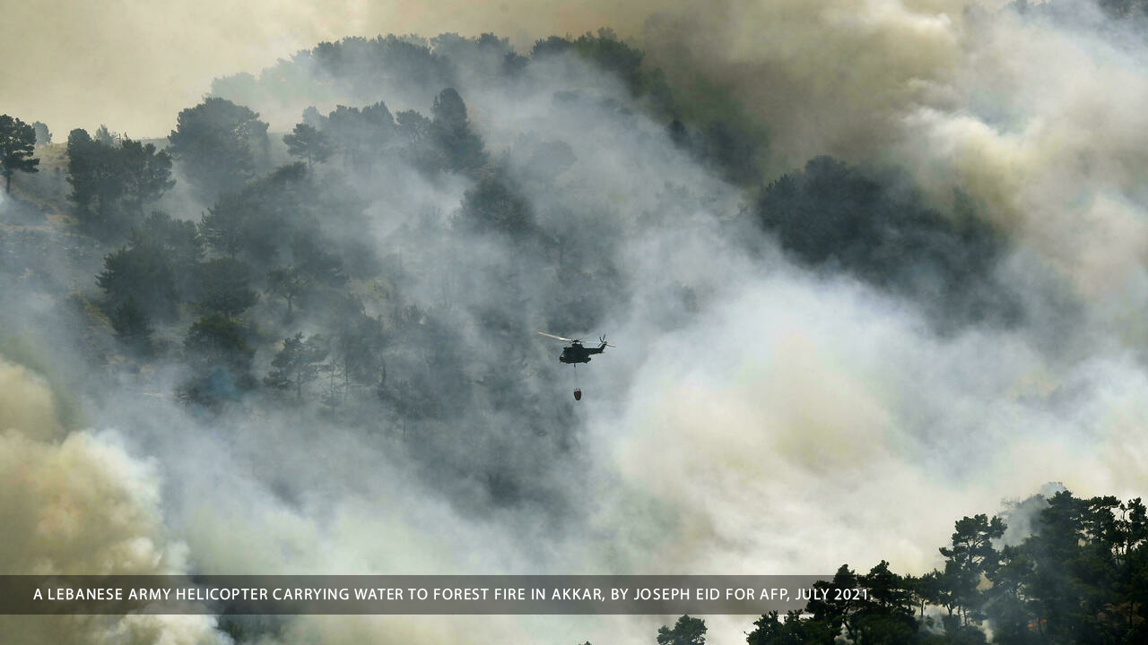 Lebanese Army helicopter putting out forest fire in Akkar