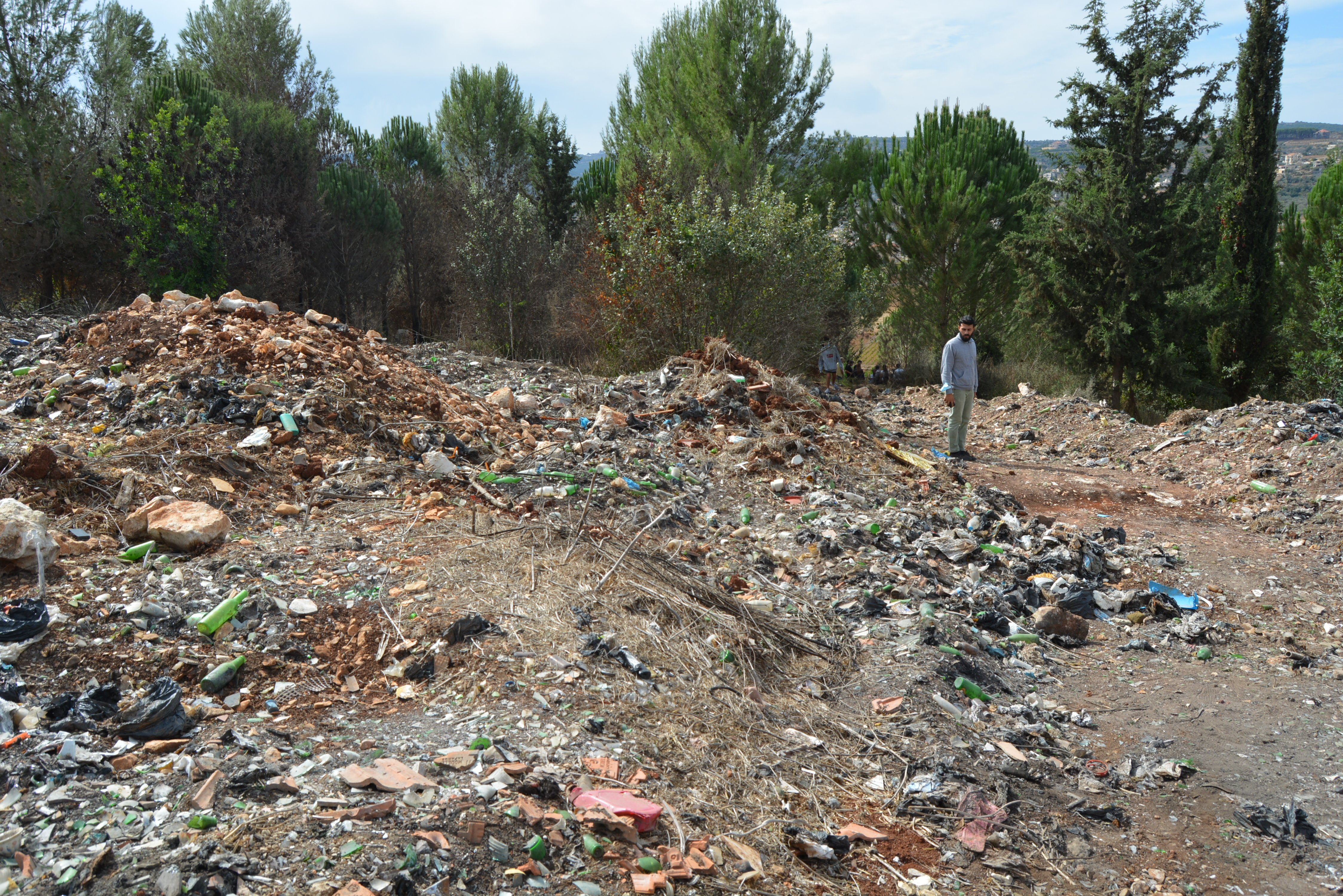 Open dump full of flammable materials in the Al Waraa Forest, by EA