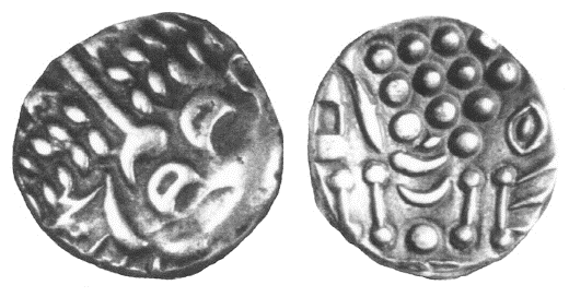 photograph showing both sides of a silver coin