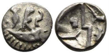 photograph showing both sides of a silver coin