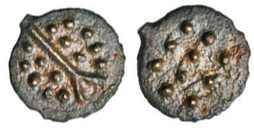 photo of both sides of a billon coin. one side has 14 raised dots besected by a raised line which branches toward one edge, the other side has 10 raised dots.