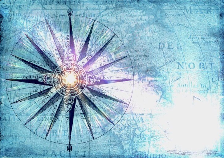 An antique compass rose on a sky blue background with fading traces of an old map symbolizing the role of Destiny as an ethical compass