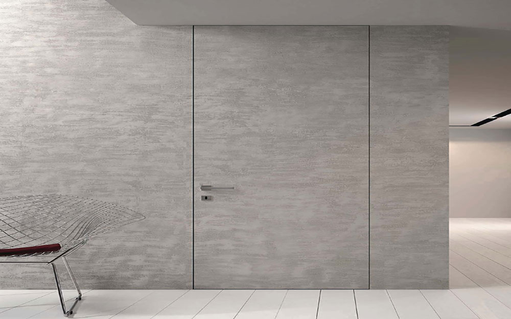 Εσωτερικές πόρτες με κρυφή κάσα αλουμινίου χωνευτή στον τοίχο.