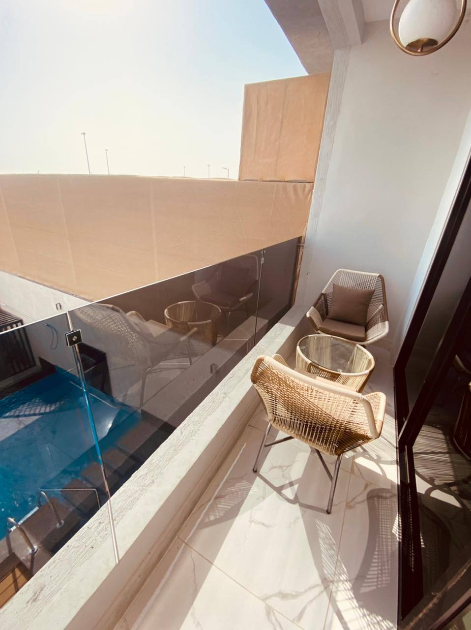 Two-storey chalet with a view of the garden and the pool