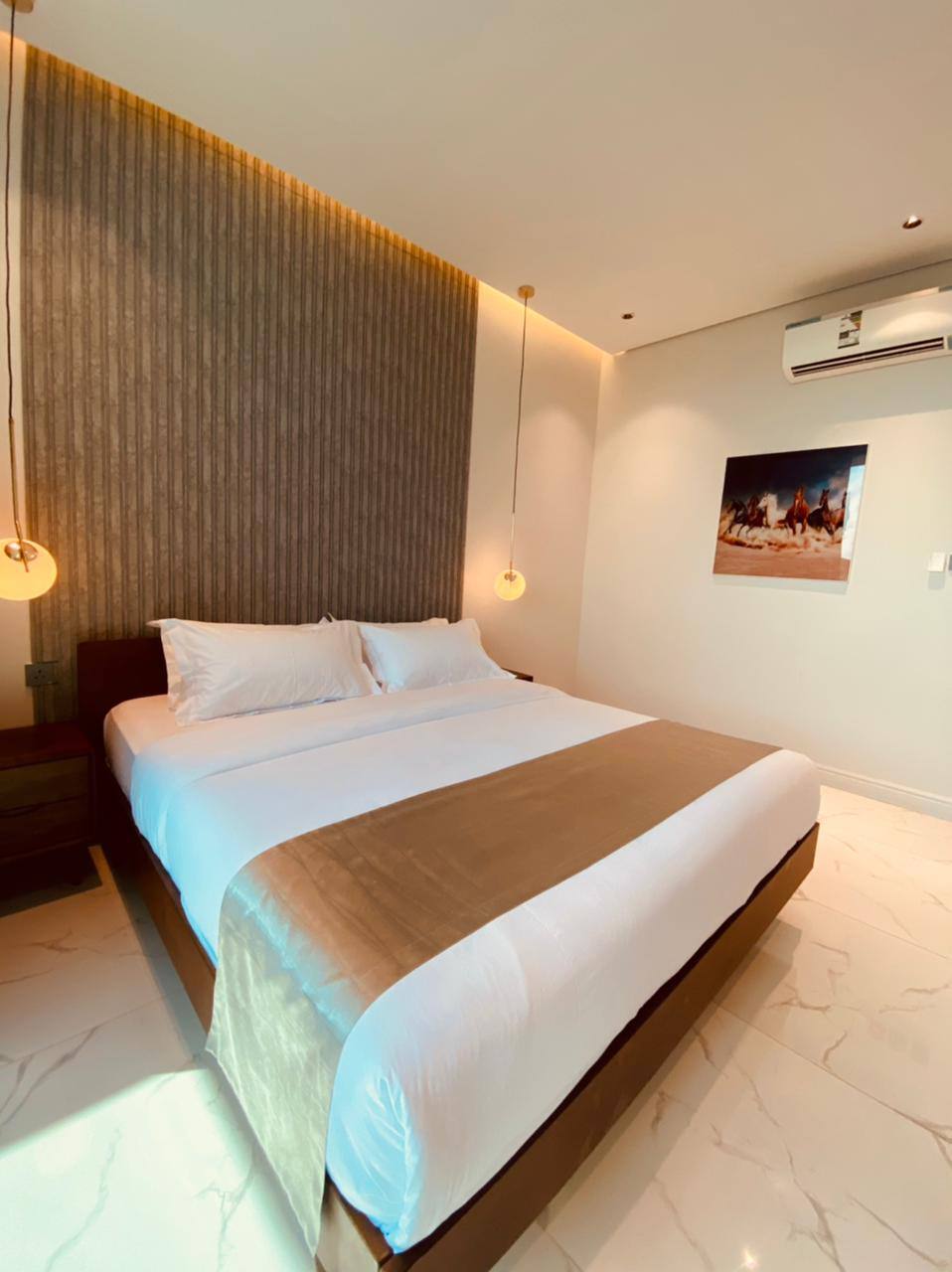 Two-storey chalet with a view of the garden and the pool