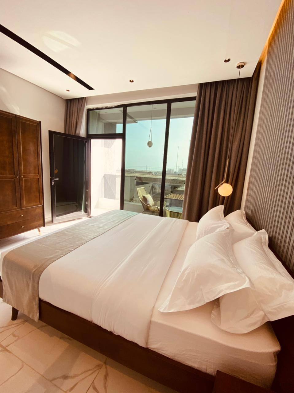 Two-storey chalet with a view of the garden and the pool