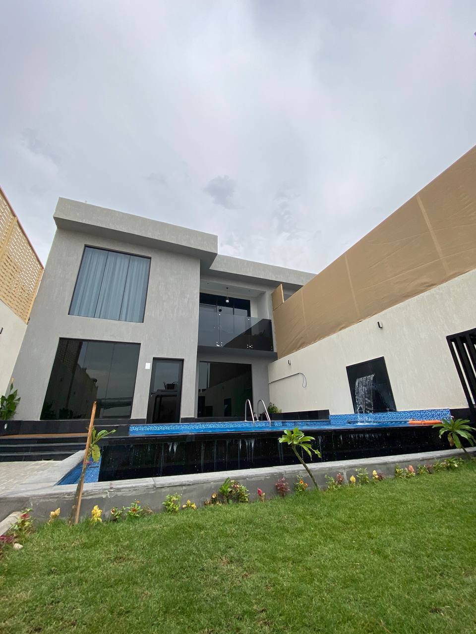 Two-storey chalet with a view of the garden and the pool