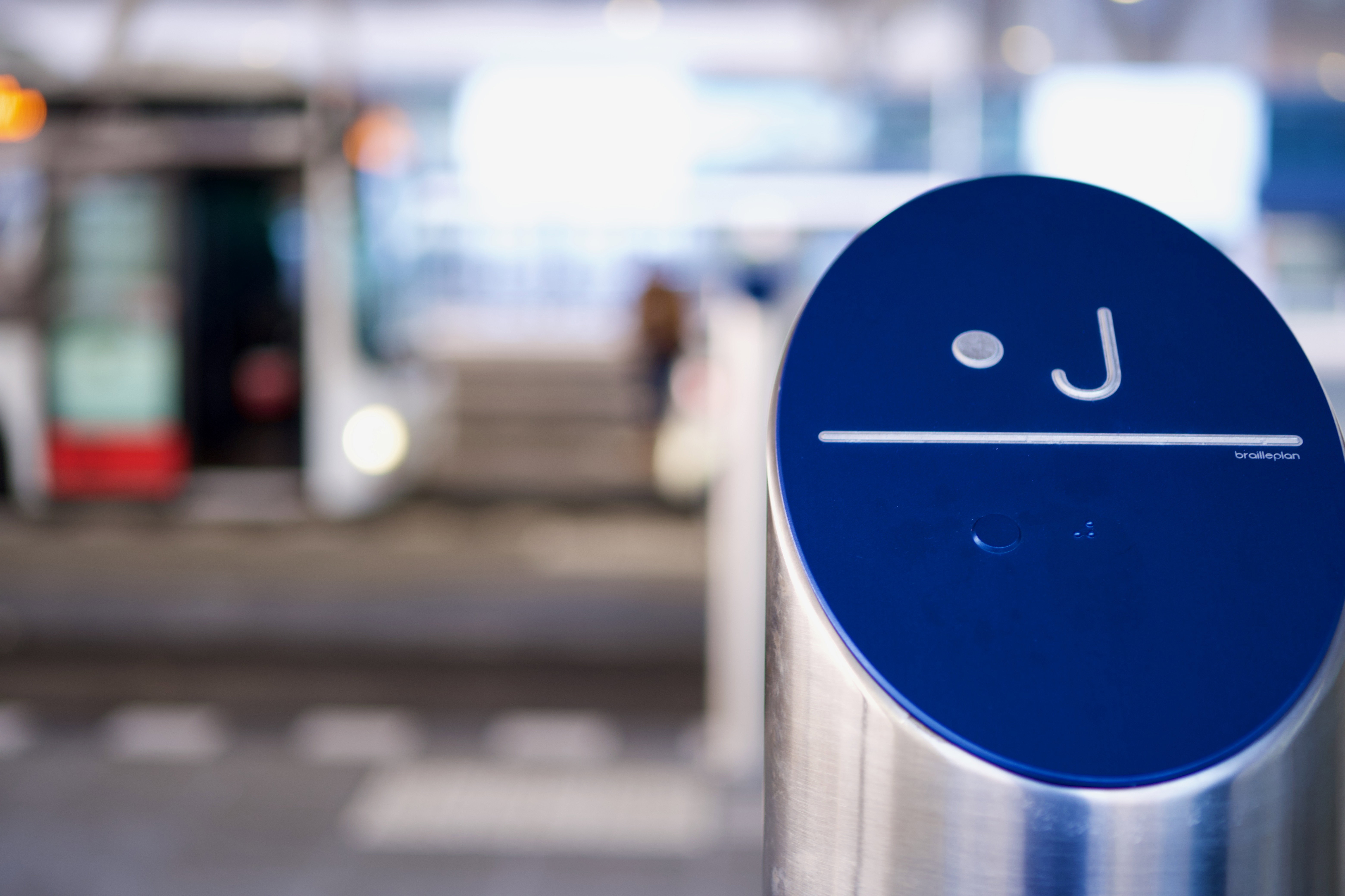 Tactile bus stop pole