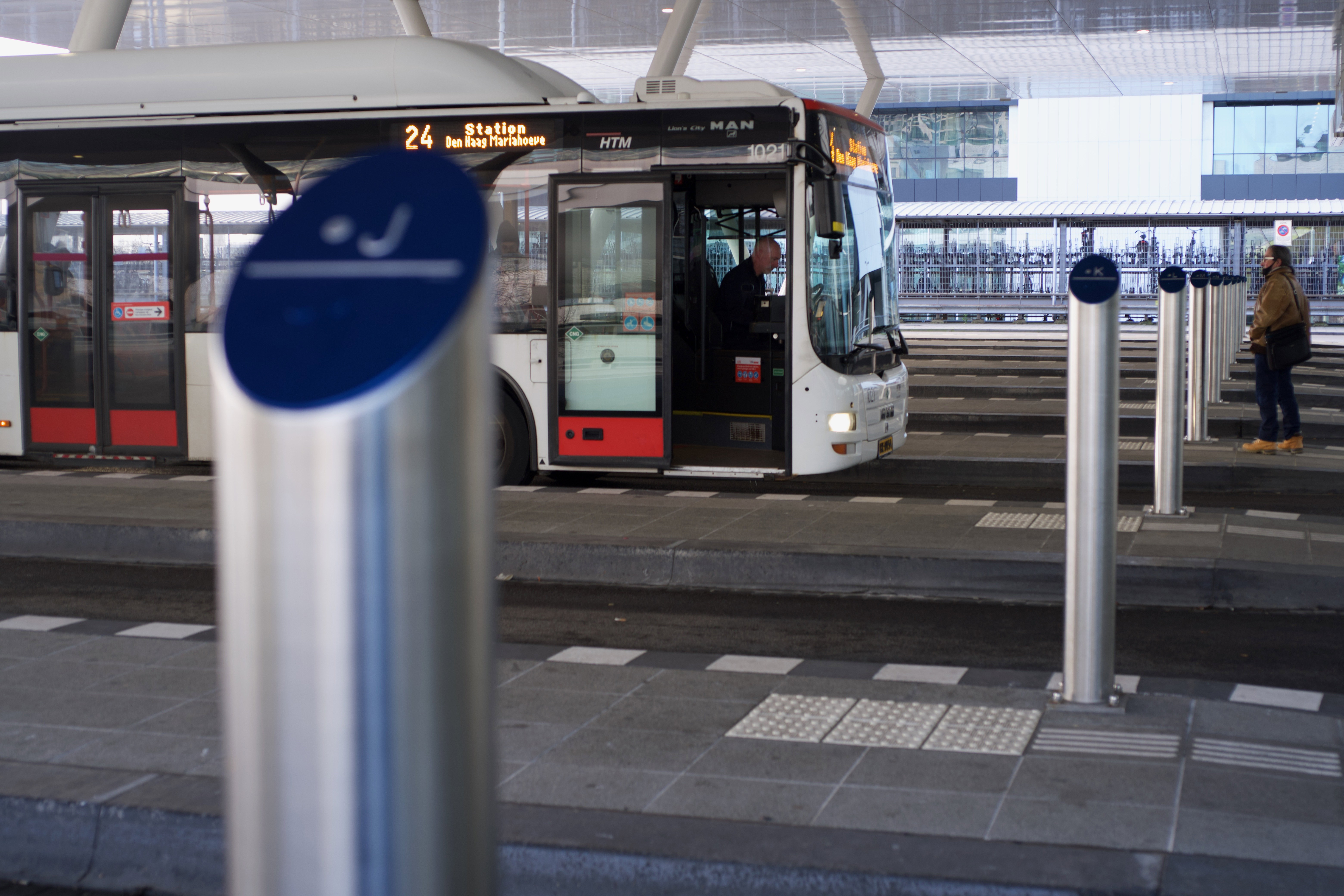 Tactile bus stop pole