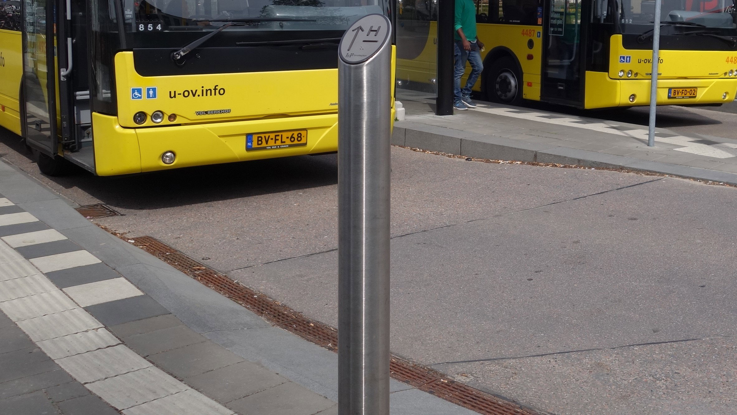 Tactile bus stop pole