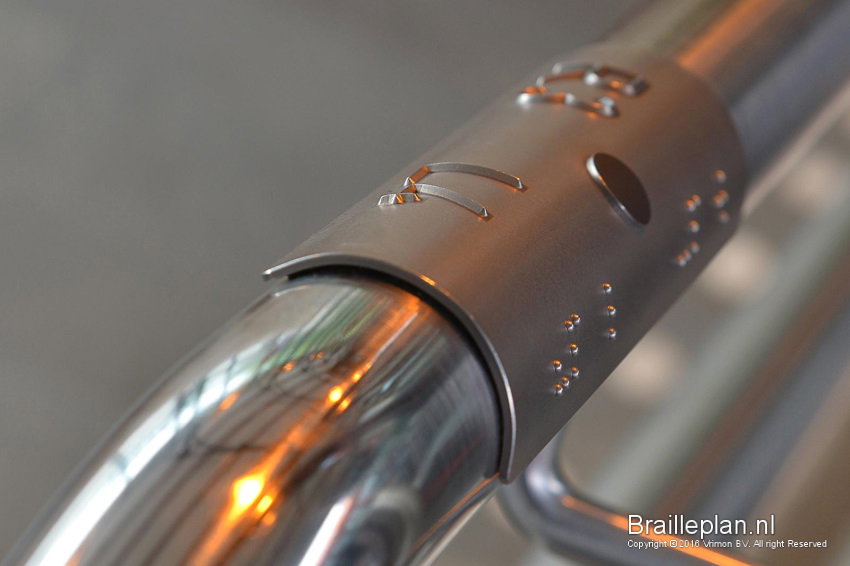 Braille handrail signs