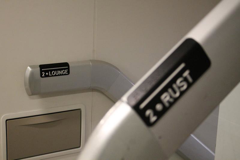 Braille handrail signs