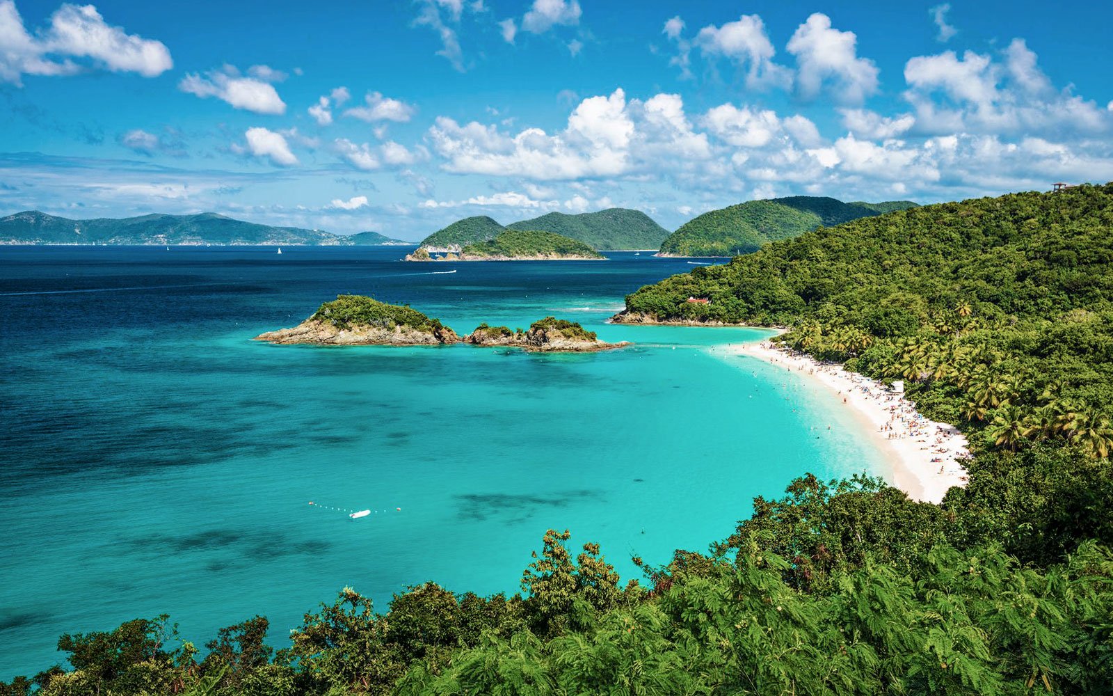 Trunk Bay, U.S. Virgin Islands: A Serene Retreat on St. John. Escape to the peaceful shores of Trunk Bay on St. John in the U.S. Virgin Islands. This palm-fringed beach offers a pristine and idyllic setting for a tranquil escape. Dive into the vibrant coral reefs for an unforgettable snorkeling experience or simply relax on the soft sand while gazing at the breathtaking views. Trunk Bay is a sanctuary of serenity away from the crowds, allowing you to reconnect with nature and find inner peace.
