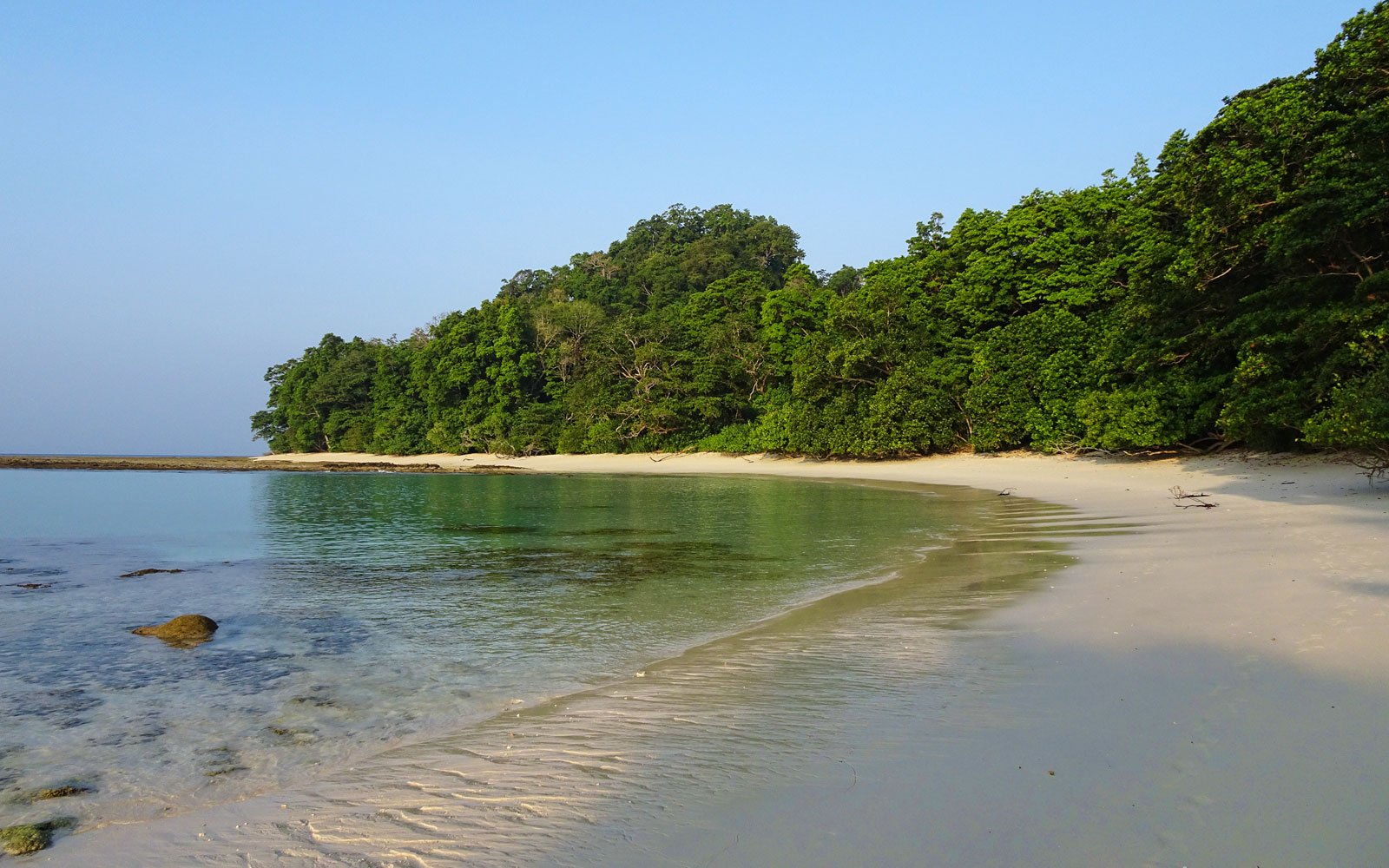 Radhanagar Beach, India: A Hidden Gem in the Andaman and Nicobar Islands. Uncover the untouched beauty of Radhanagar Beach, located on Havelock Island in the Andaman and Nicobar Islands of India. With its untouched natural beauty, calm waters, and serene ambiance, this beach offers a peaceful retreat for those seeking tranquility. Immerse yourself in the soothing sounds of the ocean, take a leisurely swim, or simply marvel at the breathtaking sunset. Radhanagar Beach is a hidden gem that will leave you in awe.