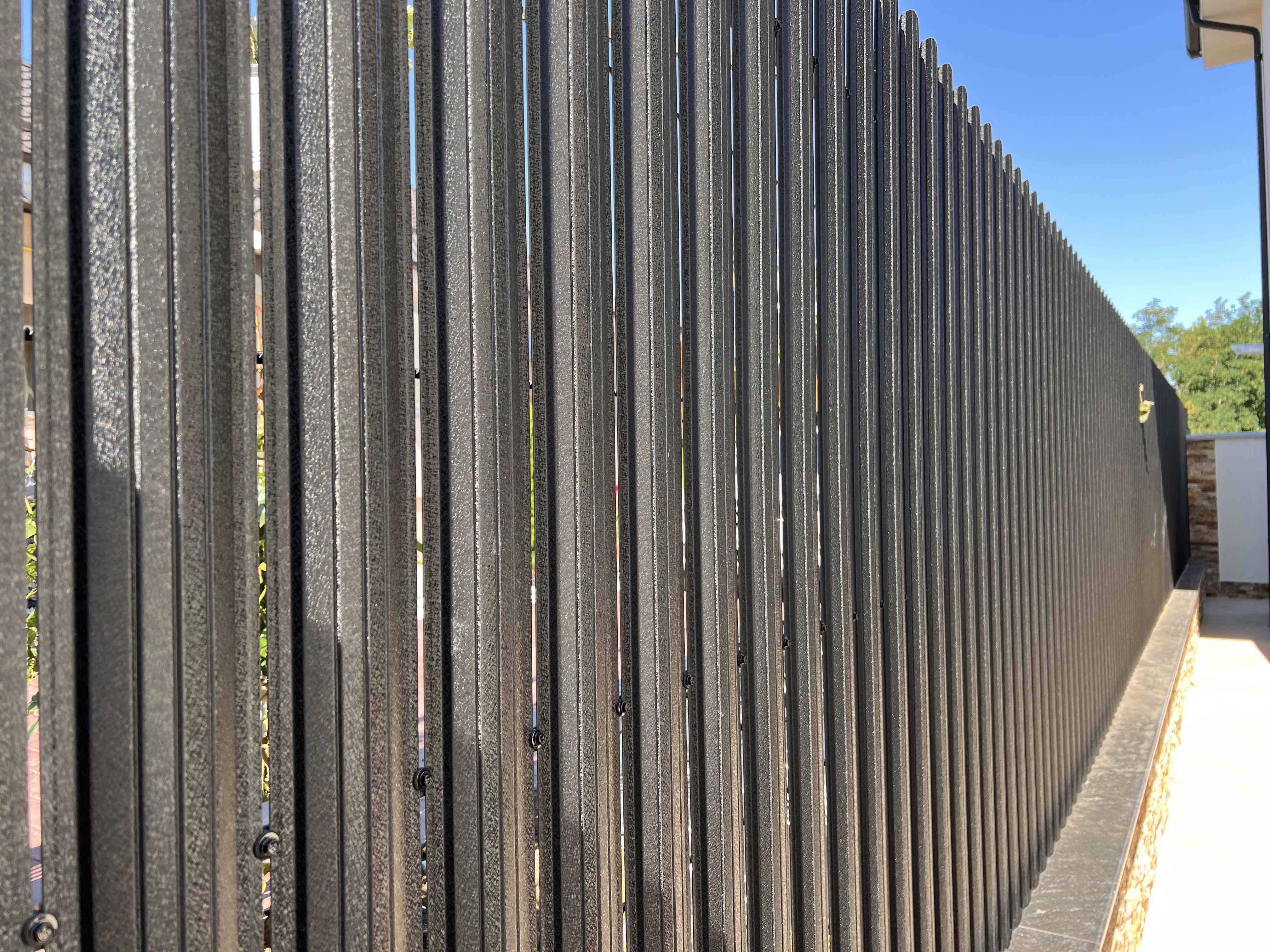 Metal slatted fences