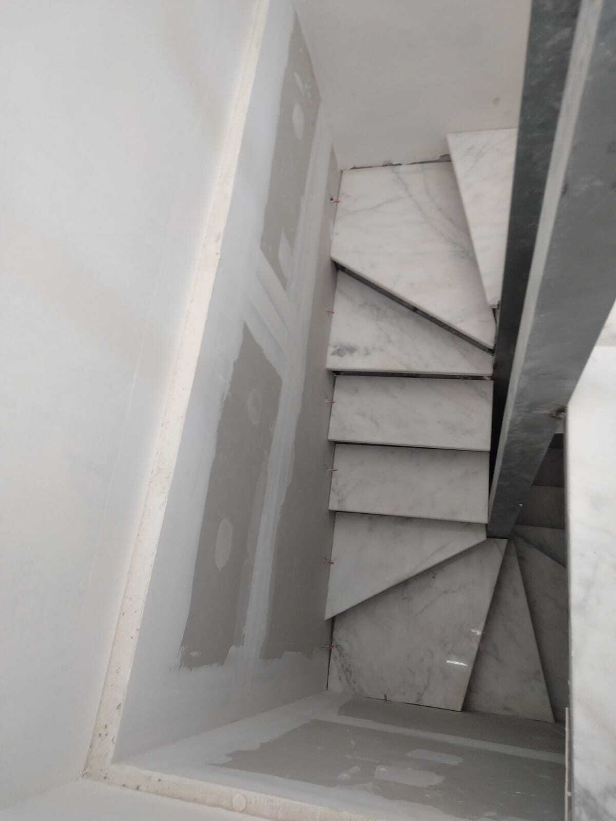 Interior staircase for a duplex apartment