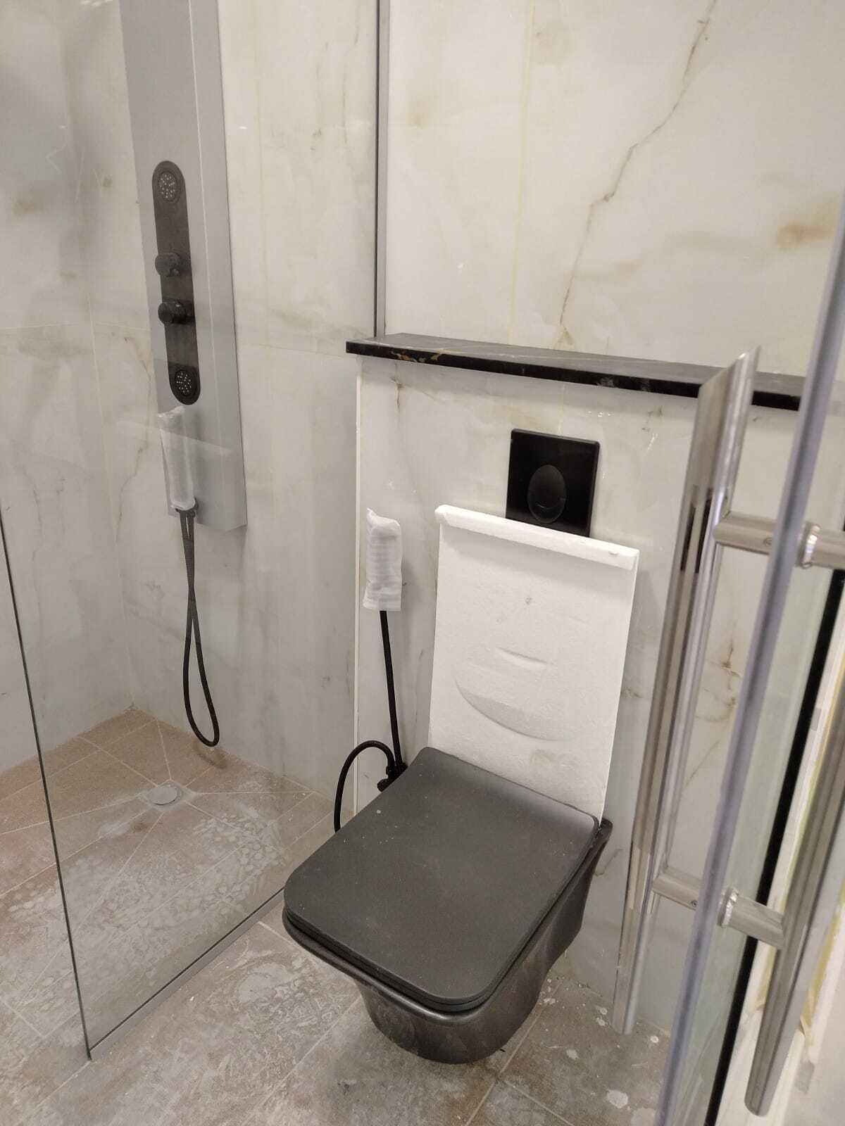 "Enjoy a masterpiece in every corner of your bathroom with our exquisite designs." Modern bathroom decorations and accessories.