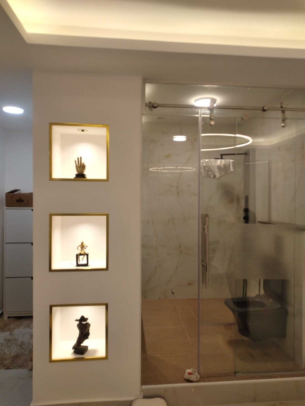"Enjoy a masterpiece in every corner of your bathroom with our exquisite designs." Modern bathroom decorations and accessories.