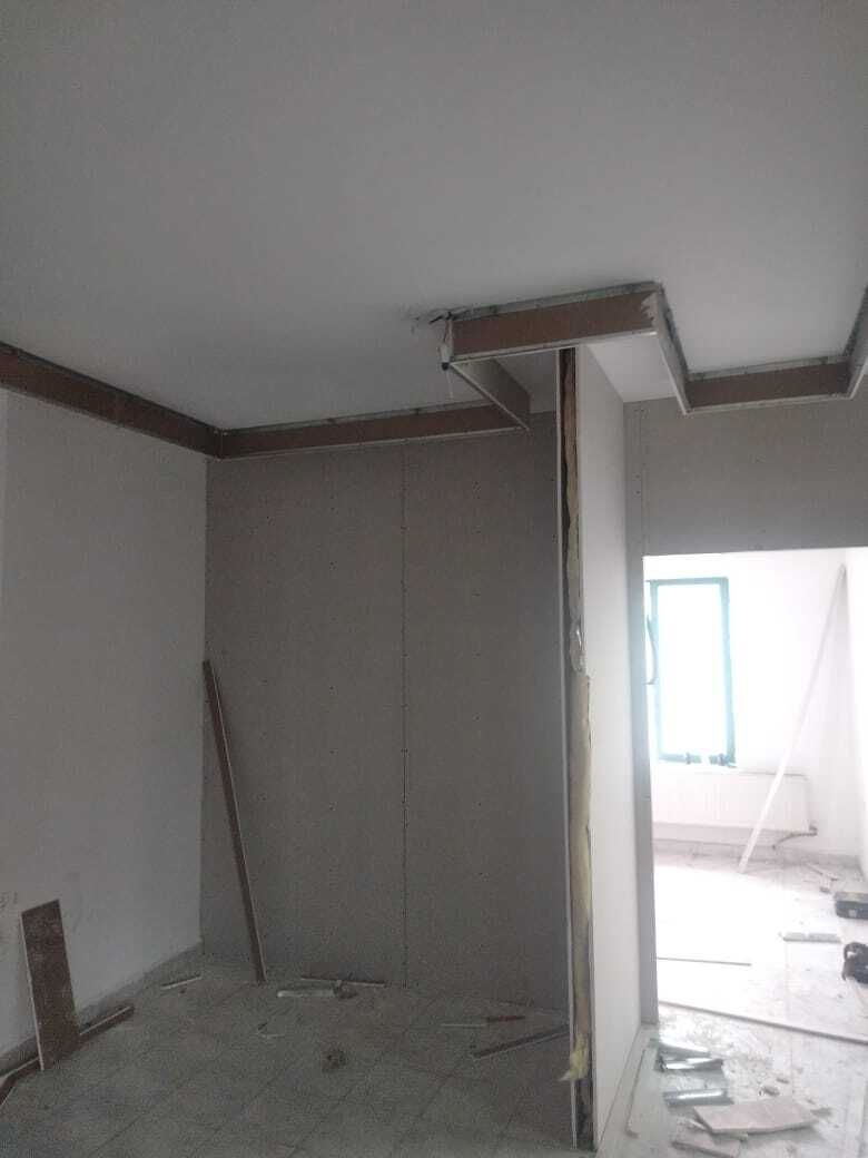 Implementation of decoration works inside a medical clinic in the Al-Rasheed suburb.