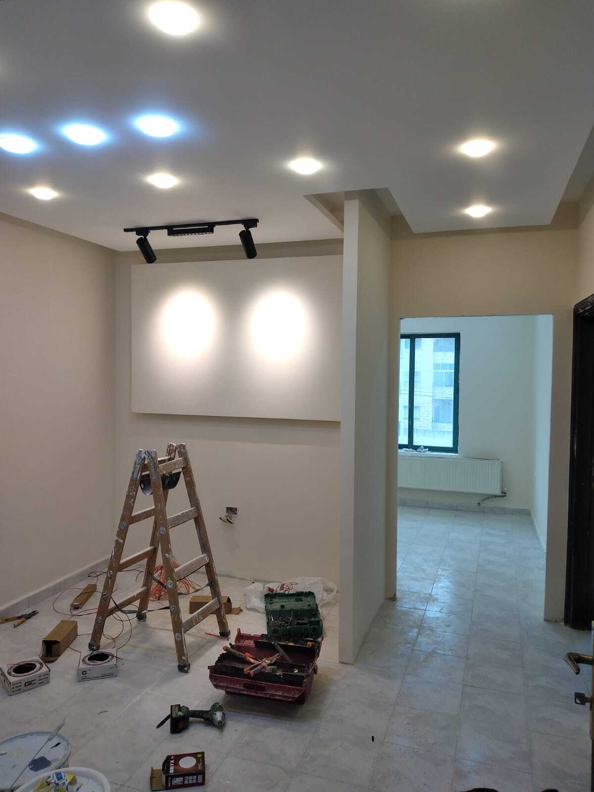Implementation of decoration works inside a medical clinic in the Al-Rasheed suburb.