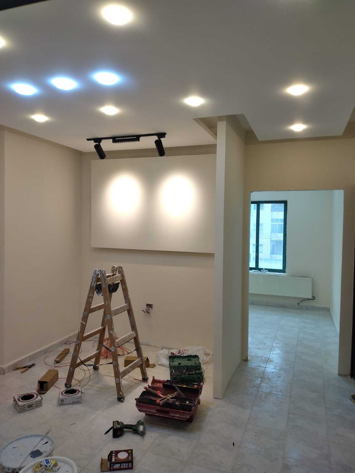 Implementation of decoration works inside a medical clinic in the Al-Rasheed suburb.