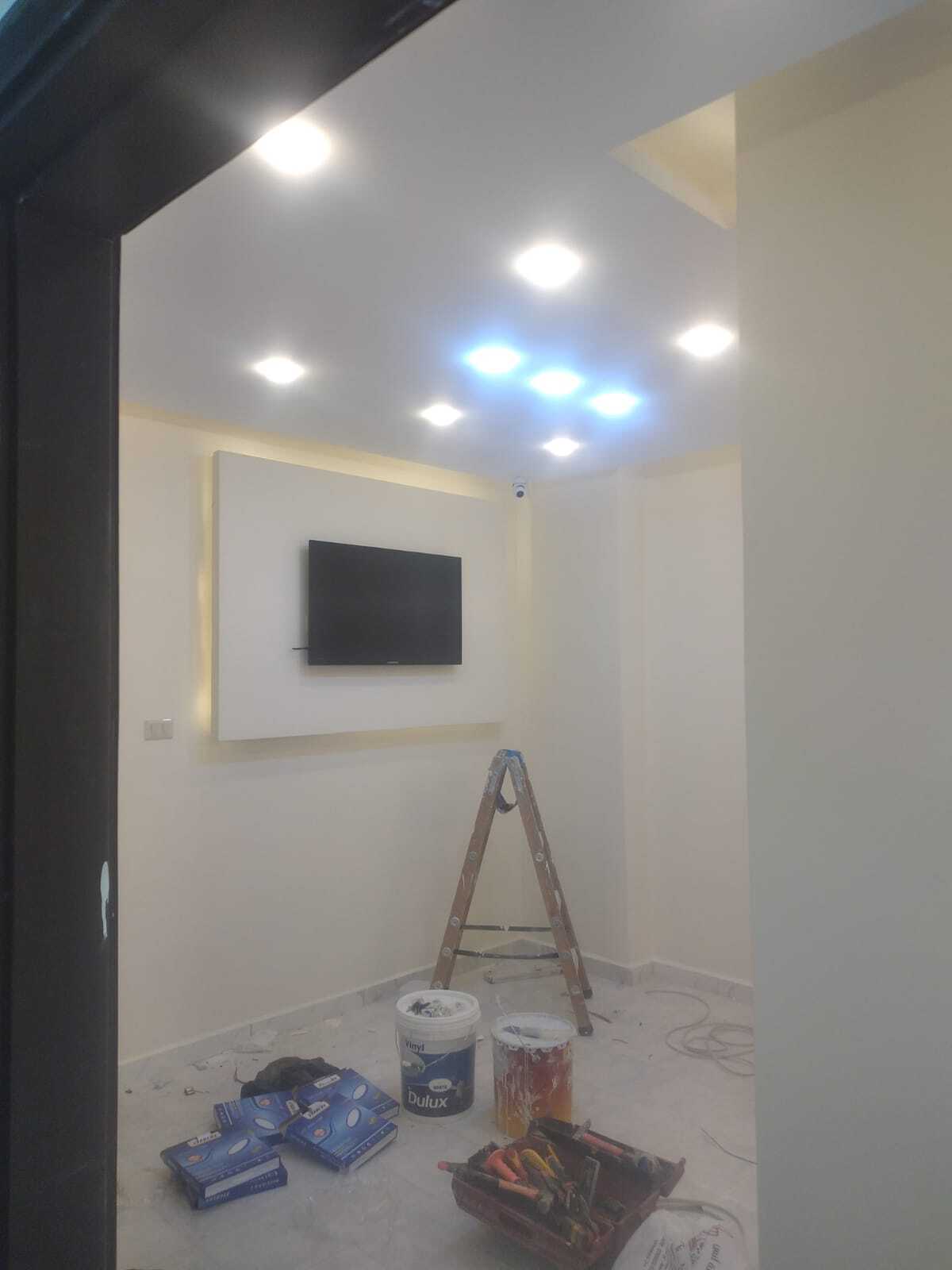 Implementation of decoration works inside a medical clinic in the Al-Rasheed suburb.
