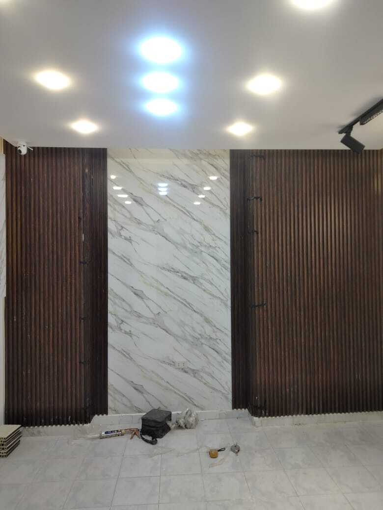 Implementation of decoration works inside a medical clinic in the Al-Rasheed suburb.