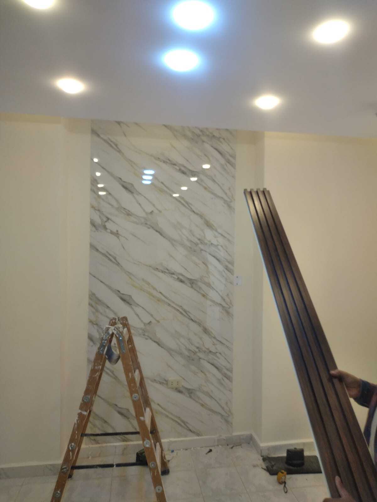 Implementation of decoration works inside a medical clinic in the Al-Rasheed suburb.