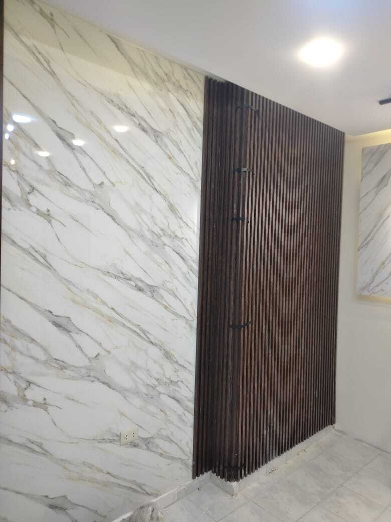 Implementation of decoration works inside a medical clinic in the Al-Rasheed suburb.