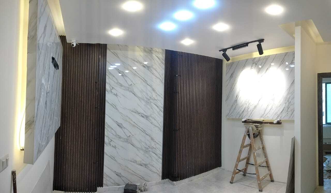 Implementation of decoration works inside a medical clinic in the Al-Rasheed suburb.