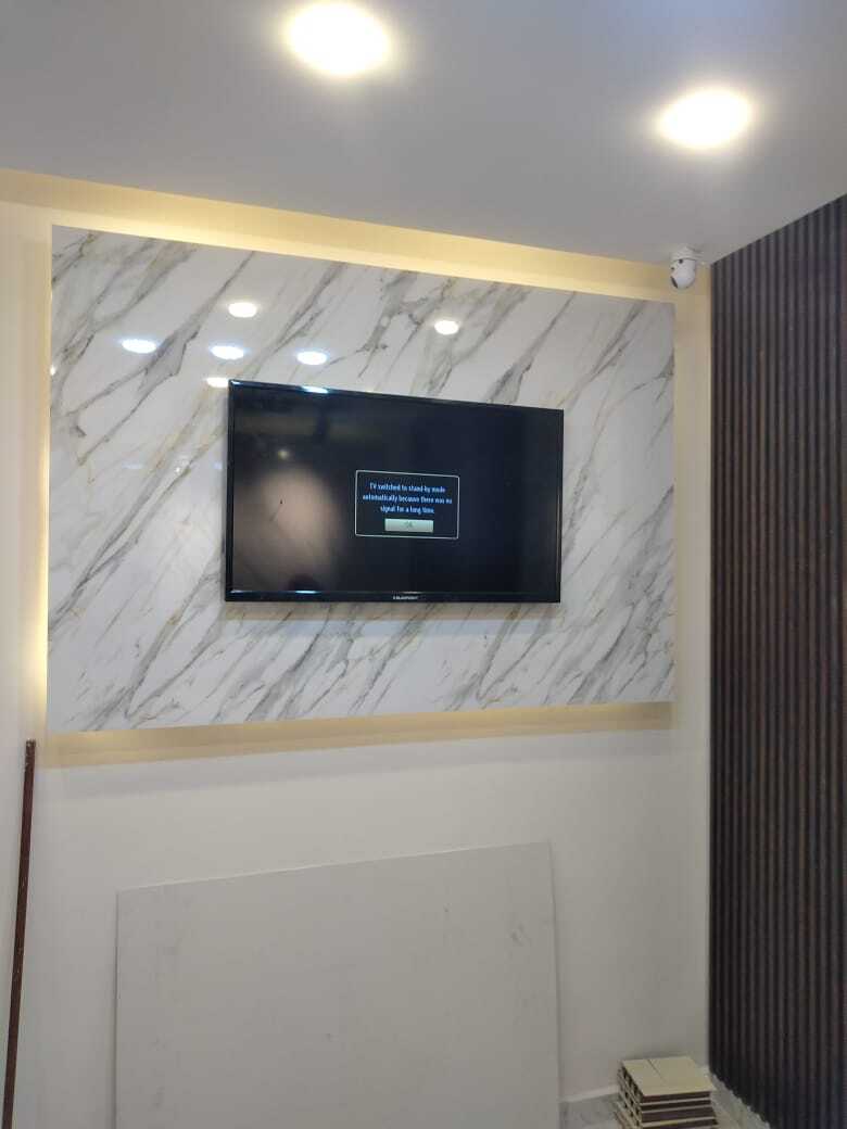 Implementation of decoration works inside a medical clinic in the Al-Rasheed suburb.