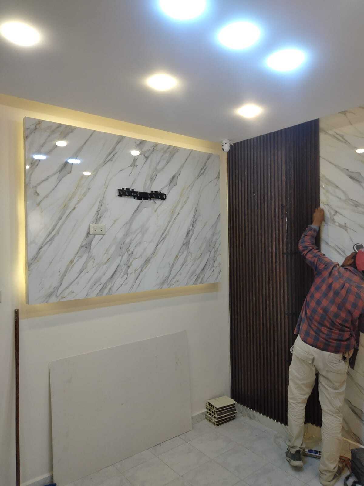 Implementation of decoration works inside a medical clinic in the Al-Rasheed suburb.