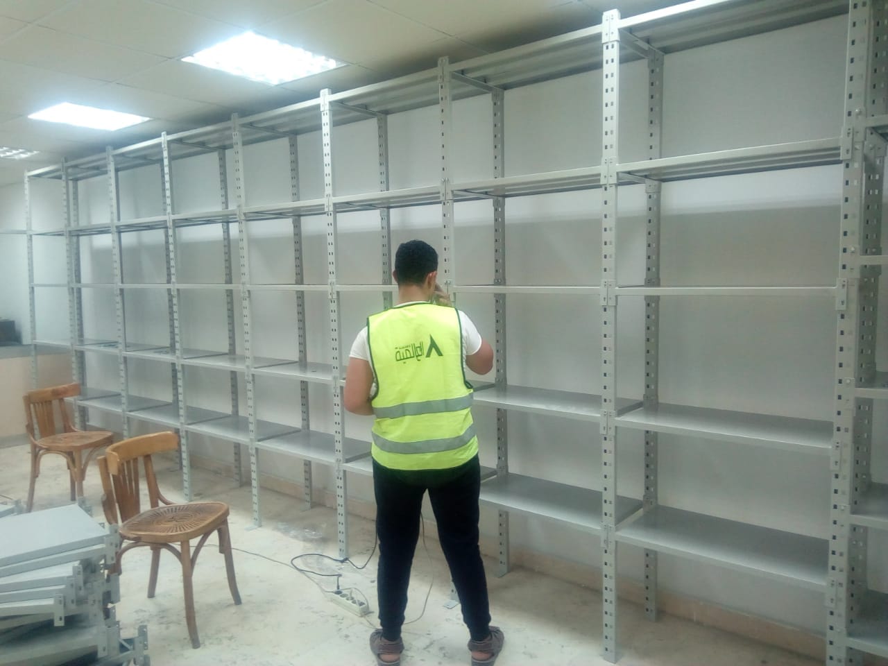 بعض الصور من اعمالنا { تجهيز مخازن }