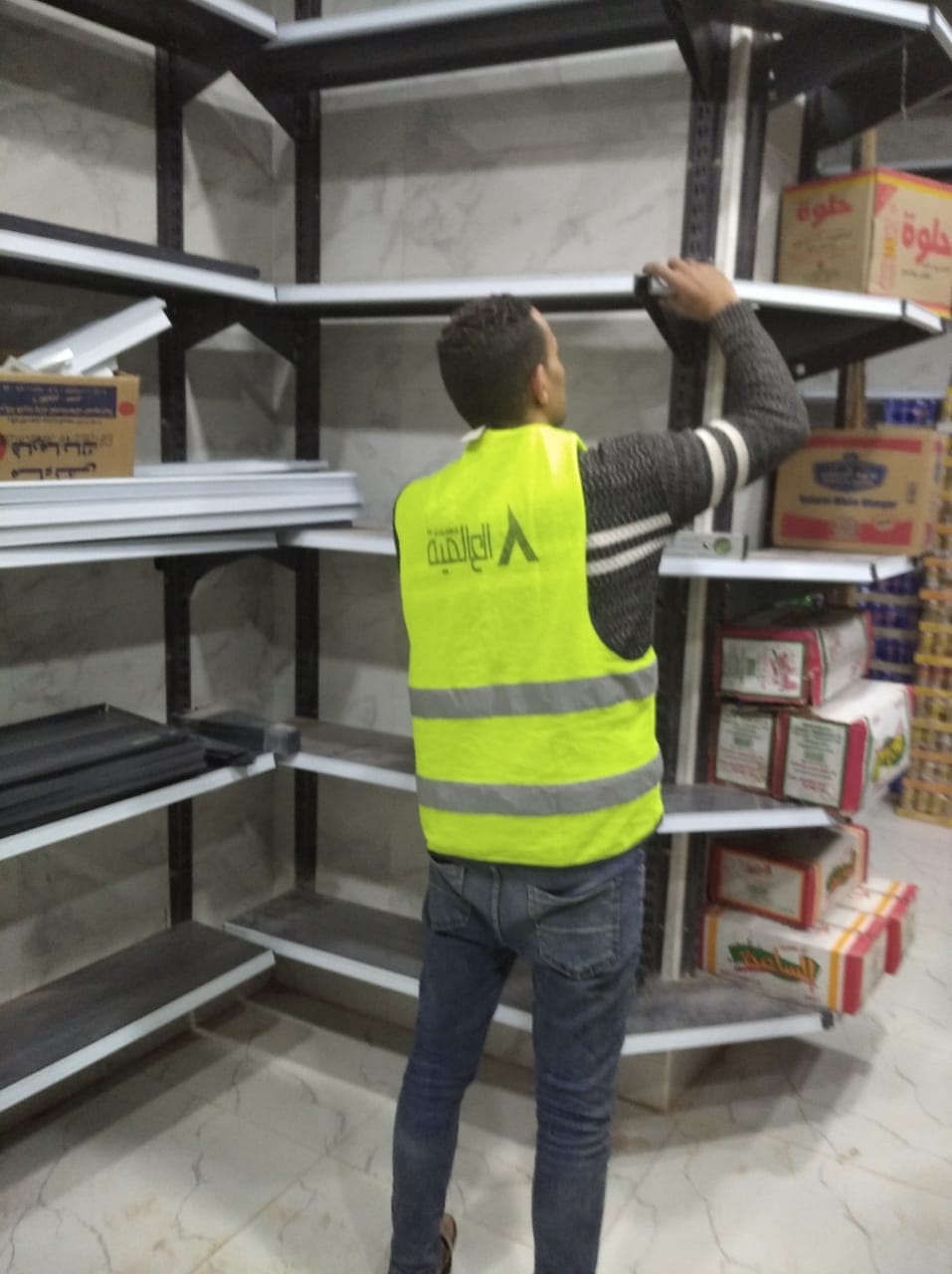 بعض الصور من اعمالنا { تجهيزات سوبر ماركت }