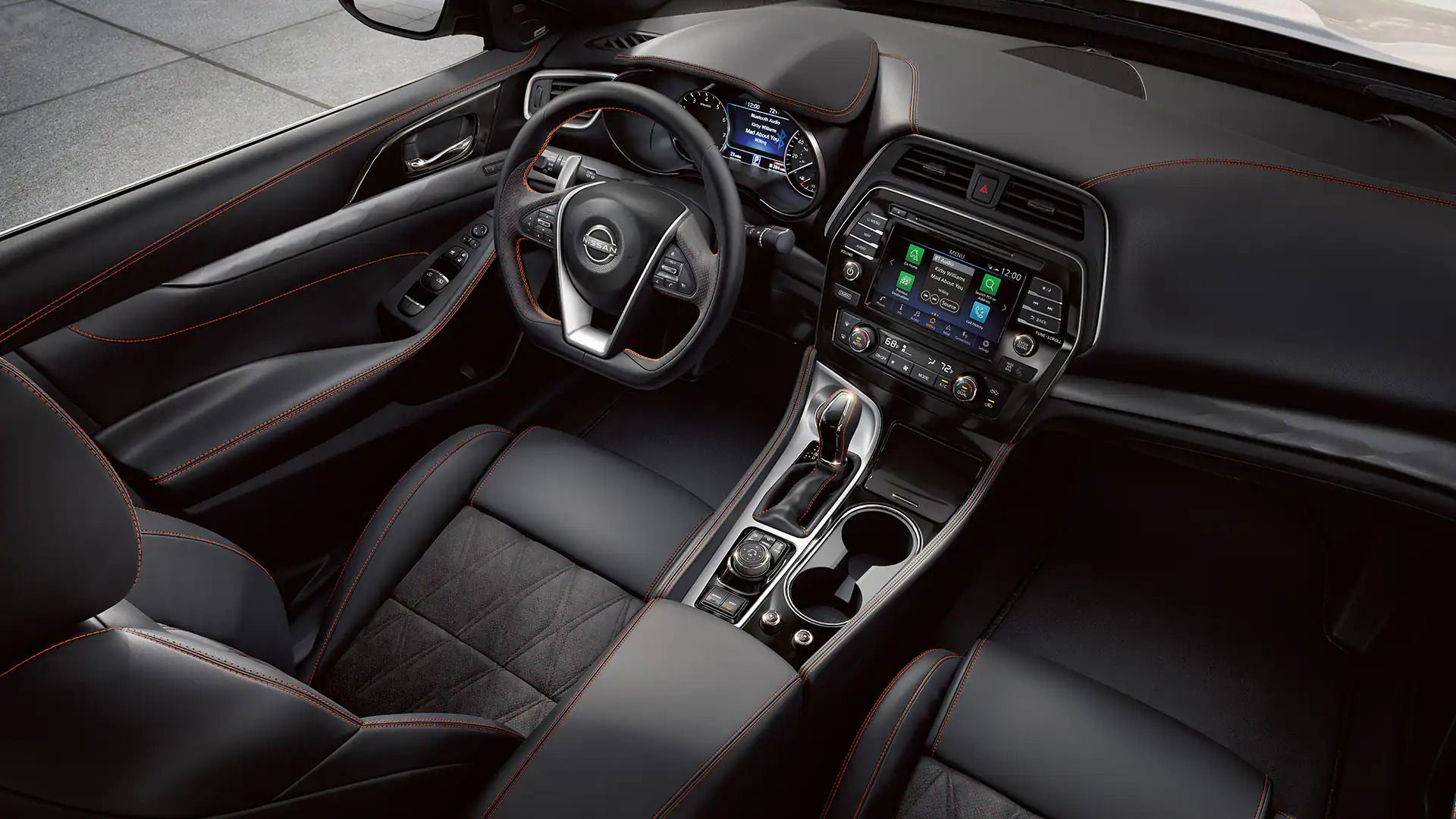 2023-nissan-maxima-black-interior-with-red-contrast-stitching Via Nissan.