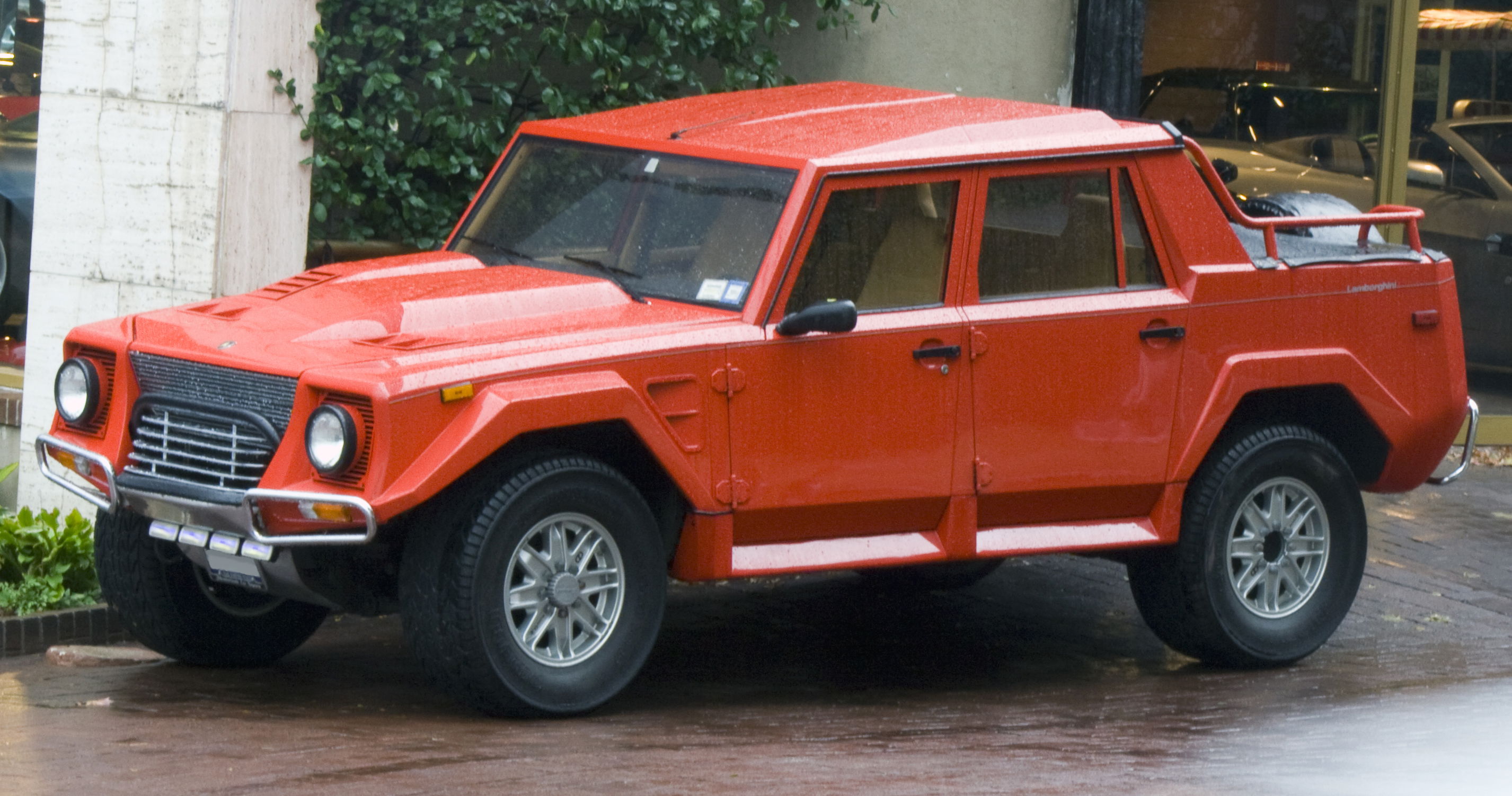 The toughest trucks ever built - 1990_Lamborghini_LM002_in_Red,_front_left Mr.choppers via Wikimedia.